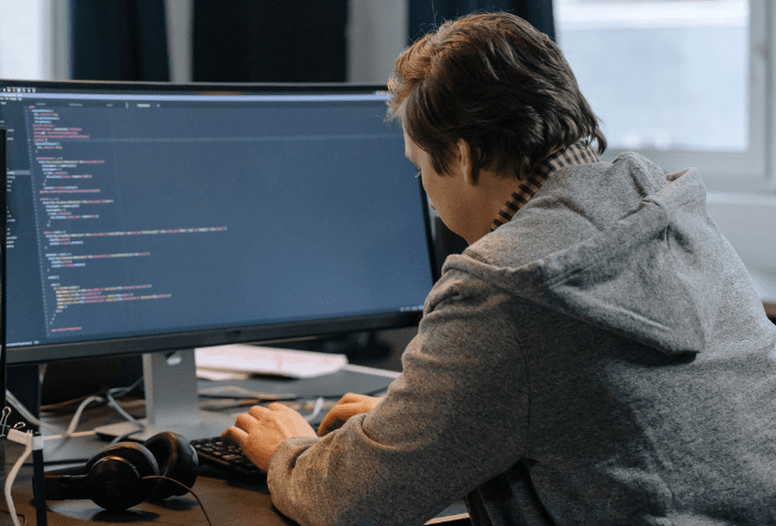 Image of a man coding